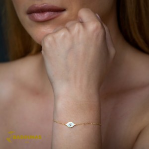 Bracelet Eye Yellow gold K14 with black color diamonds and Corian Code 011321